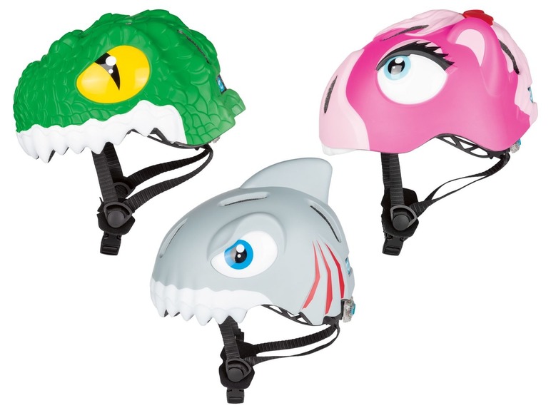 Drei Kinderhelme mit Tiermotiven: Krokodil, Hai und Pferd.