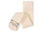 Beige Baby-Strumpfhosen mit einem Bärenmotiv.