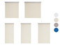 Beige Rollos in verschiedenen Größen.