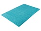 Eine türkisfarbene Badematte mit weicher Textur.