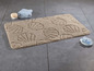 Beige Badezimmermatte mit Muschel-Design.