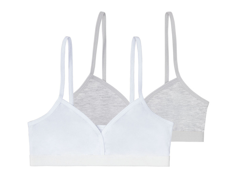Zwei Sport-BHs, einer weiß und einer grau.