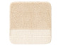 Eine beige Badematte mit einem helleren Unterteil.