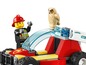 Ein LEGO Feuerwehrfahrzeug mit Feuerwehrmann und Eule.