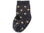 Graue Babysocken mit gelben Punkten und rutschfester Sohle.