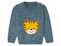 Ein blauer Strickpullover mit einem Tiger darauf.