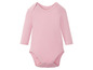 Ein rosa Baby-Body mit langen Ärmeln.