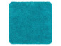 Eine türkisfarbene Badematte mit einer weichen, plüschigen Textur.