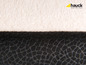 Beige und schwarzes Textil eines Hauck Kinderprodukts.