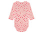 Ein rosa Babybody mit roten Herzen.