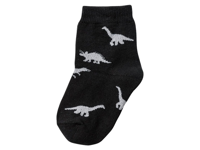 Schwarze Socken mit weißen Dinosauriern.