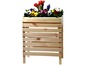Ein Blumenkasten aus Holz mit Blumen