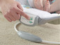 Ein Ingenuity Baby-Schaukelstuhl mit Bedienelementen für Musik und Bewegung.