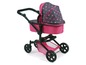 Ein rosa Puppenwagen mit Sternenmuster.
