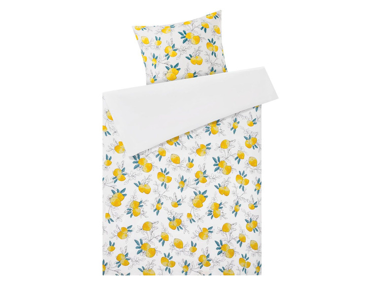 Ein weißer Bettbezug mit Zitronenmuster.