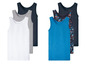 Sechs Tanktops für Jungen in verschiedenen Farben und Mustern.