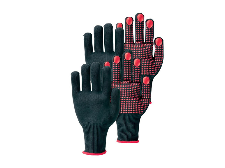 Zwei Paar schwarze Handschuhe mit roten Punkten.