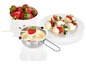 Schokoladenfondue mit Erdbeeren und einem Fonduetopf.