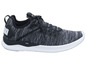 Schwarze Puma Ignite Sneaker mit grauem, gewebtem Obermaterial.