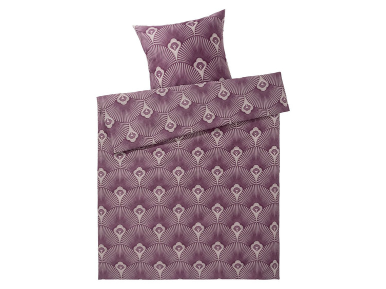 Ein lilafarbener Bettbezug mit geometrischem Muster.