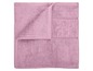 Ein rosa Handtuch gefaltet.