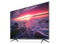 Ein Xiaomi Smart-TV mit einem rosa Sonnenuntergang über dem Meer.