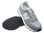 Graue New Balance Sneaker mit silbernem Logo.