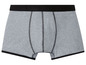 Graue Boxershorts mit schwarzem Bund.