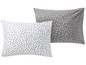 Zwei Kissenbezüge mit weißen Punkten auf grauem Hintergrund.
