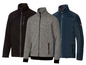 Drei Fleecejacken in Schwarz, Grau und Blau.