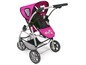 Ein rosa Kinderwagen mit schwarzem Punktmuster