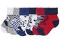 Sechs Paar Babysocken mit verschiedenen Mustern.