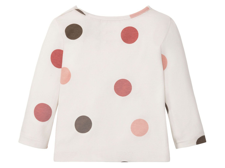 Weißes Langarmshirt mit rosa und braunen Punkten.