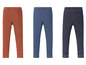 Drei Paar Leggings in Blau, Dunkelblau und Orange.