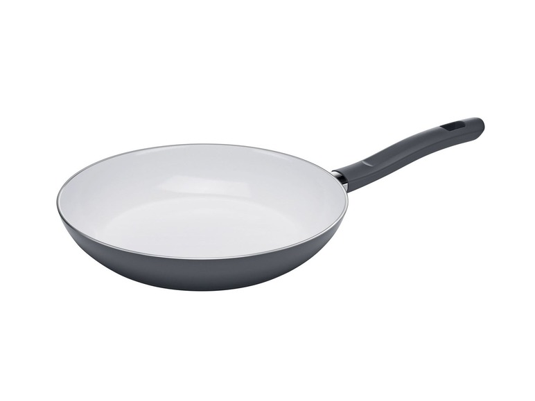 Eine graue Bratpfanne mit einer weißen Antihaftbeschichtung.