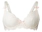Ein weißer BH mit Spitze und rosa Details.