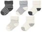 Schwarze, graue und weiße Babysocken mit Streifen.