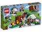 LEGO Minecraft Set mit einem Haus, einem Schaf und einem Eisengolem.