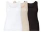 Drei Tanktops in weiß, beige und schwarz.