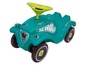 Ein türkisfarbenes Big Bobby Car mit Sternen und einem grünen Lenkrad.