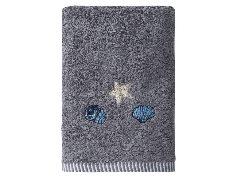 Grauer Handtuch mit Muscheln und Sternen.