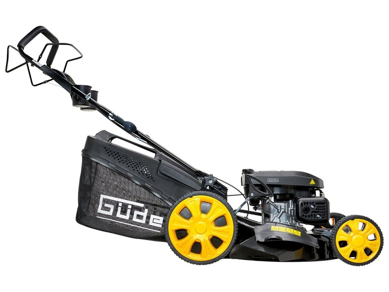 Ein schwarzer Güde Rasenmäher mit gelben Rädern.