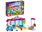 LEGO Friends Bäckerei mit Roller, zwei Puppen und einem Hund.