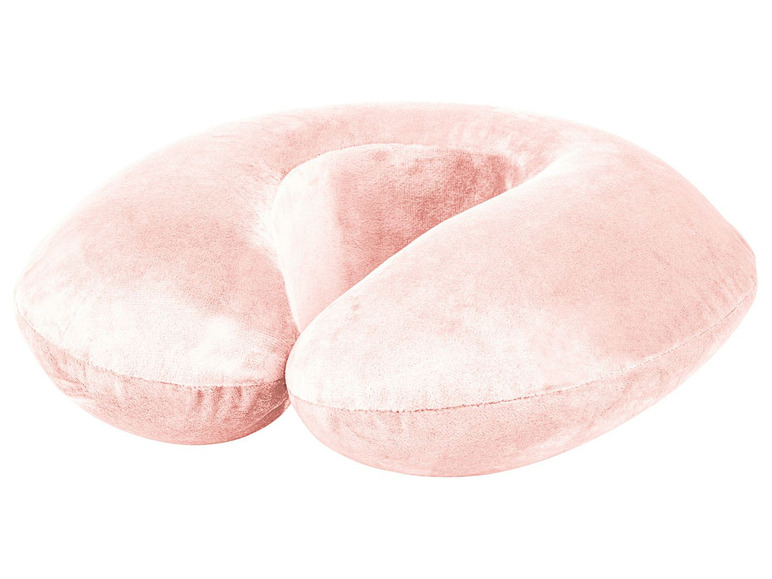 Ein rosafarbenes Nackenkissen zum Reisen.