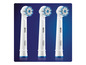 Drei Oral-B elektrische Zahnbürstenköpfe.