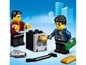 Lego City Polizist verhaftet einen Verbrecher mit Geld und Goldbarren.