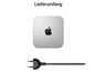 Ein silberner Apple Mac mini mit schwarzem Stromkabel.