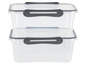 Zwei transparente Aufbewahrungsboxen mit Griffen.