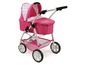 Ein rosa Puppenwagen mit Sternenmuster.