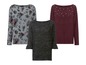 Drei Langarmshirts: eines mit Blumenmuster, eines mit Perlen und eines unifarben.
